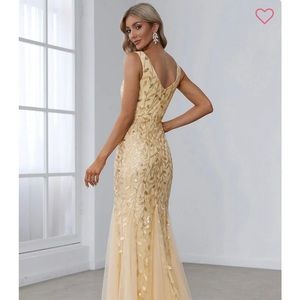 Beautiful golden gown dress for wedding or formal event